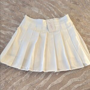 White pleated skirt